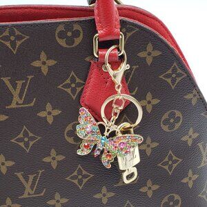 100% Auth Louis Vuitton Lock & Key with unbranded Bagcharm, Keycharm, Keychain